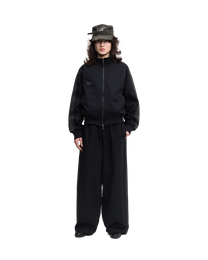Black track pants - hover